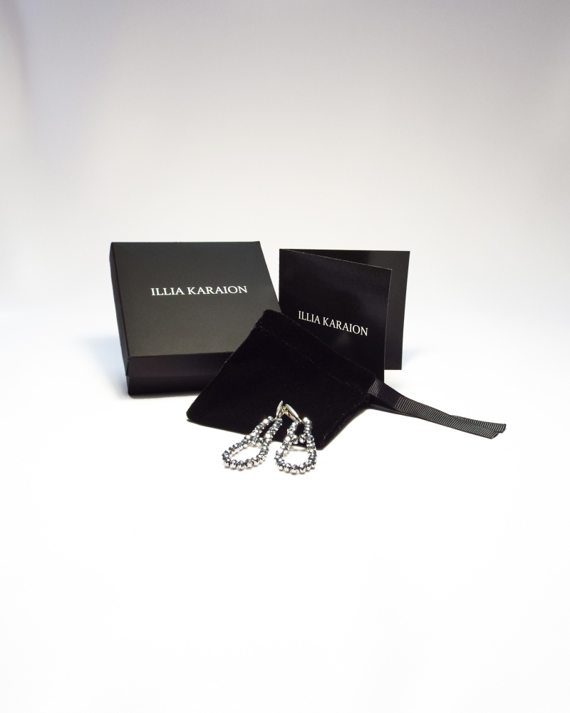 Gray crystal “drop” earring with english sterling silver clip